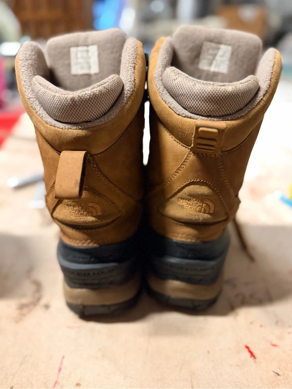 The North Face Tan and Black hi king insulated boots